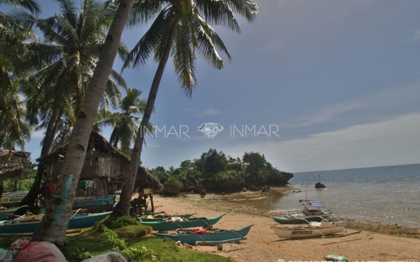 Lot for sale with cliff and white sand beach