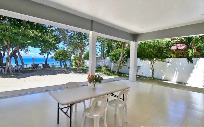 Two Houses with White Sand Beach