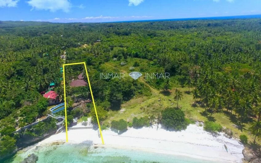 Two Houses with White Sand Beach
